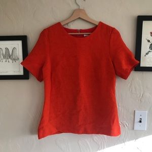 Orange lined shirt with great texture & open back